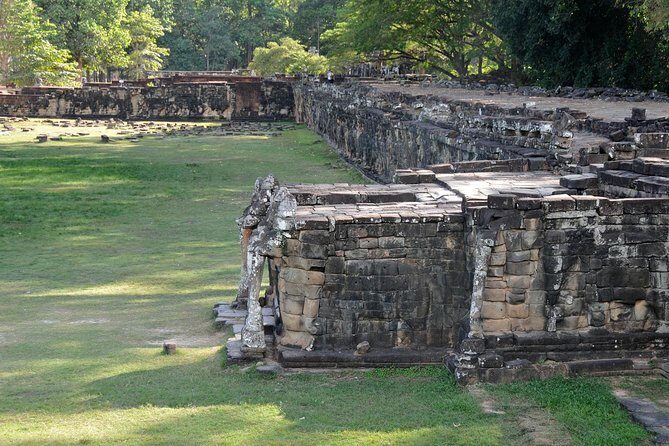 1-Day Angkor Wat Sunrise & All Interesting Temples Private Tour - Angkor Thom’s gates and faces: Victory Gate to Bayon