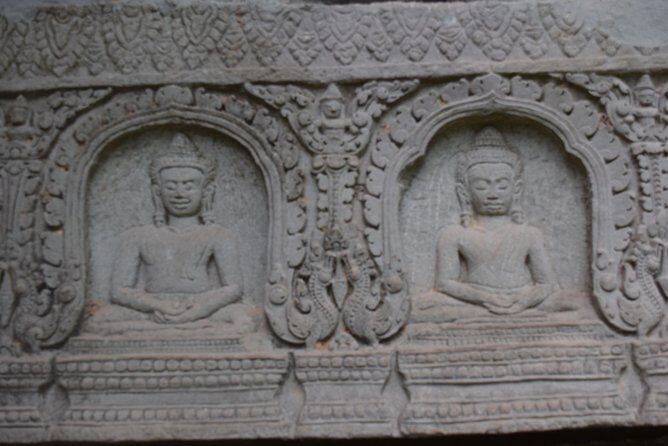 2-D Angkor temple tour with one sunrise in A/C vehicle and guide. - Day 1: Ta Prohm and Pre Rup, then Banteay Srei and Banteay Samre