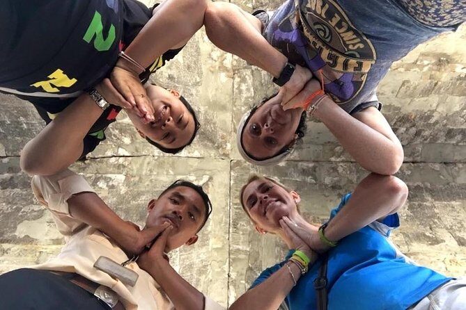 2-D Angkor temple tour with one sunrise in A/C vehicle and guide. - Day 2: Angkor Wat dawn, then Angkor Thom’s Victory Gate and more