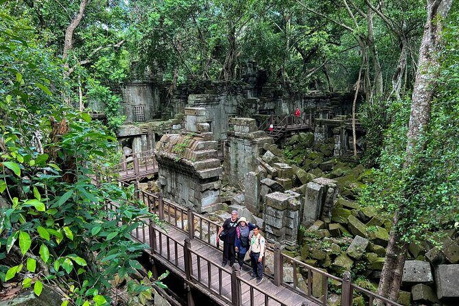 2 Day Angkor Wat Kulen Mountain Beng Mealea Floating Village Tour - Poeng Ta Kho and Preah Ang Thom: cliff views and a reclining Buddha climb