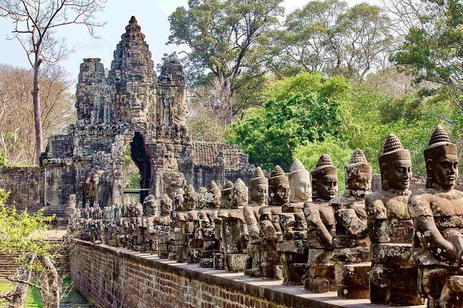 2-Day Best of Angkor Wat and Tonle Sap Lake Tour - Angkor Thom South Gate and Bayon: city walls and face-tile focus