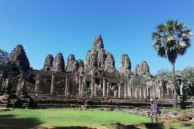 Afternoon Angkor Wat Private Tour with Sunset - Bayon and Angkor Thom South Gate: faces and city-scale planning