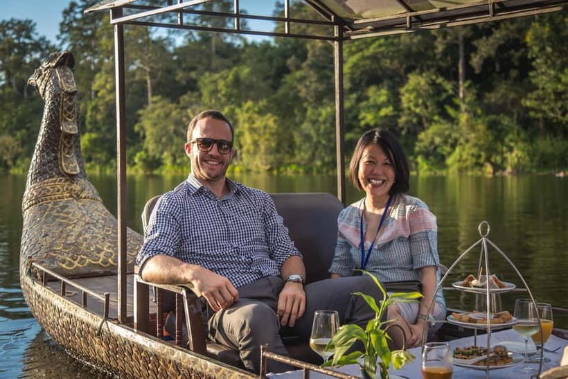 Angkor Bike tour & Gondola Sunset Boat - Cycling past Angkor Wat from behind: what you’re really getting