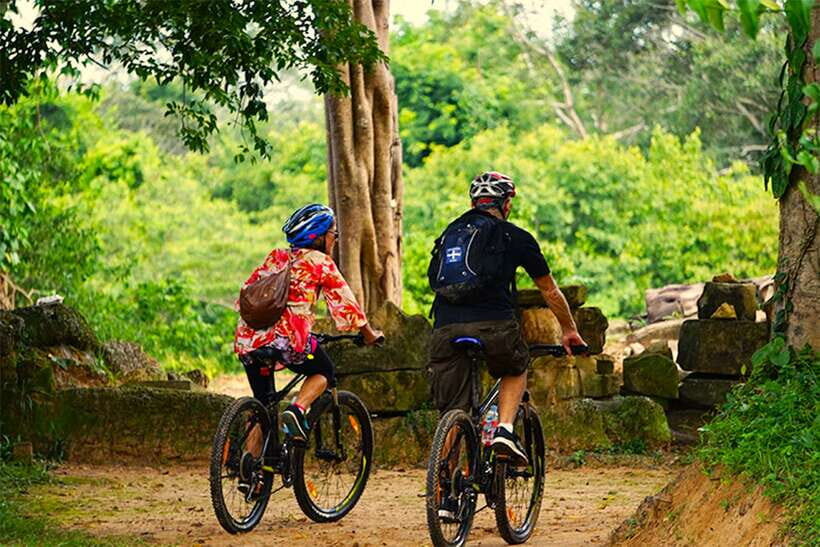 Angkor Jungle Biking Adventure Private Cycling Tour - Angkor Wat by bike: photos first, then guided meaning