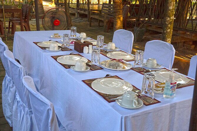 Angkor Sunrise Bike Tour - Breakfast & Lunch included - Angkor Thom south gate: quick, dramatic, and carved