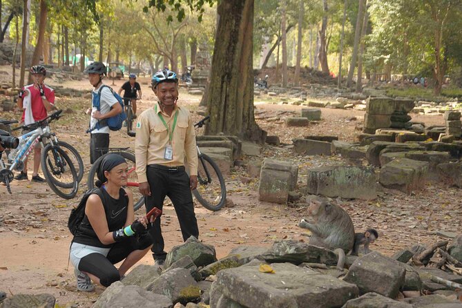 Angkor Sunrise Bike Tour with Lunch Included - Ta Nei Temple: a shorter jungle ruin stop with fruit breaks