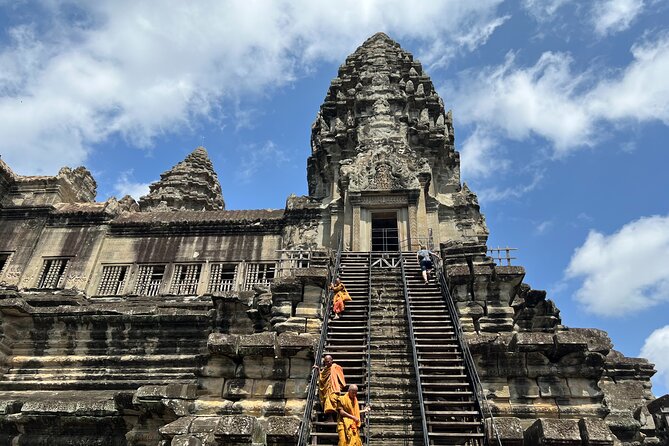 Angkor Sunrise Bike Tour with Lunch Included - Ta Prohm under giant trees: crowd strategy plus shade