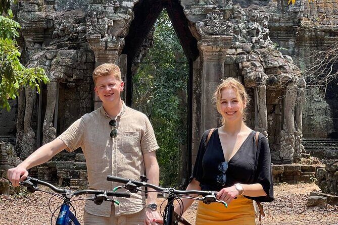 Angkor Sunrise Expedition Cycling Through Serene Backroads - Srah Srang and the calm rhythm of water-and-temple views