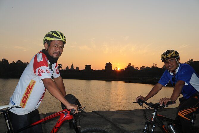 Angkor Sunrise Expedition Cycling Through Serene Backroads - Bayon faces to finish: what you’ll see at the end of the route