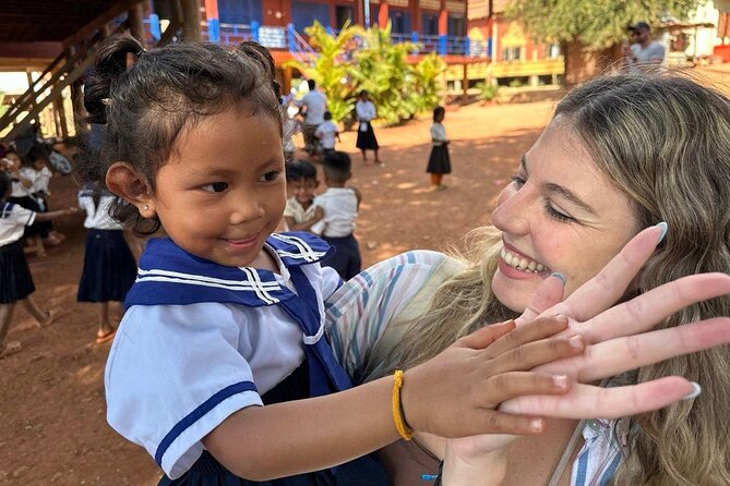 Angkor Sunrise & Floating Village Sunset Full-Day Siem Reap Tour - Bayon and Angkor Thom’s smiling faces
