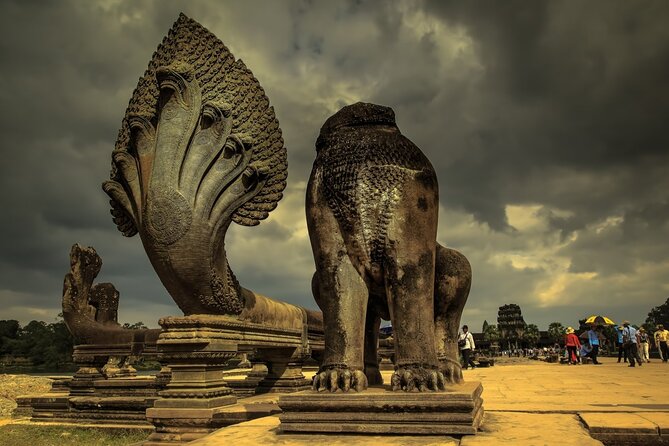 Angkor Wat Shared Tours from Siem Reap Angkor Airport (SAI) - South Gate to Bayon Temple: 54 Towers and 216 Smiling Faces