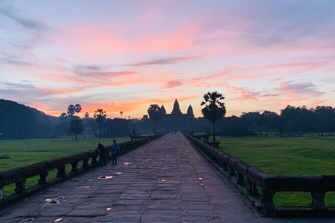 Angkor Wat Sunrise and Angkor Thom Sunset Tour - Stop 2: Ta Prohm temple walk with Bayon-style details