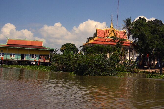 Angkor Wat Sunrise and Tonle Sap Cruise Sunset Tour - Ta Prohm: The Tomb Raider Temple and Its Fig-Tree Roots