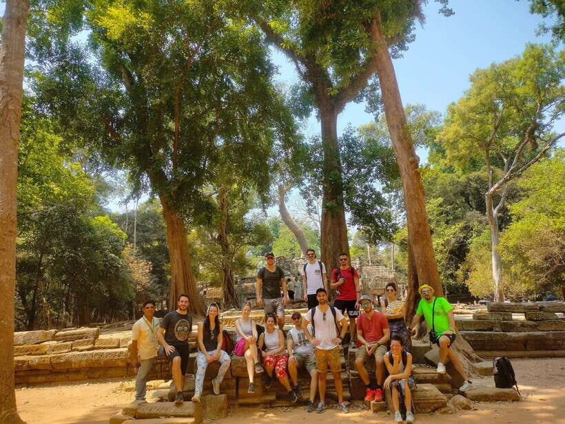 Angkor Wat Sunrise Shared Tours: Bayon-Ta Prohm-Banteay Srei - Ta Prohm: tree roots, big drama, and careful footing