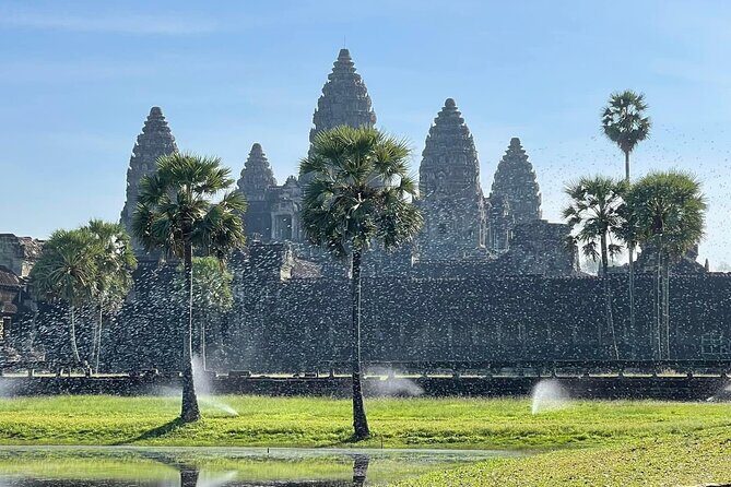 Angkor Wat Temples & Kulen Elephant Forest Day Tour - Bayon Temple Through the South Gate: 200 Smiling Faces With a City-Within-A-City Feel