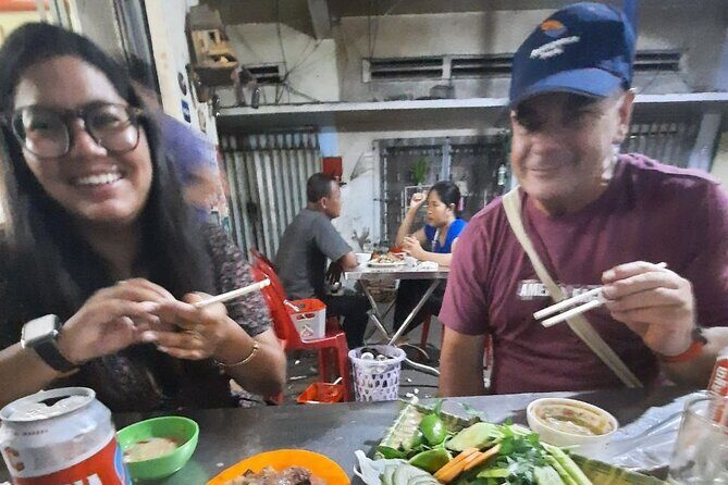 Authentic Walking Food Tour with Local Guide - Cambodia–Vietnam Friendship Monument: green curry noodles and Num Krok