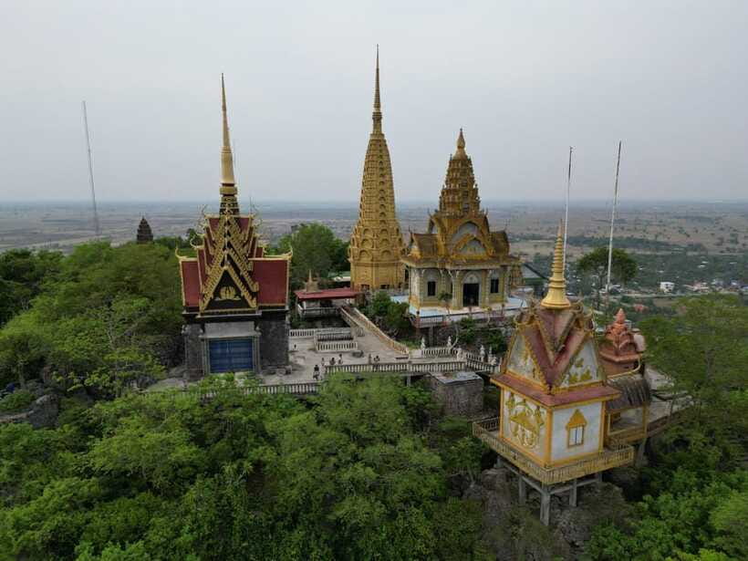Bamboo train. Phnom Sampove cave. Bat cave and Banan Temple - Rice Fields and the Simple Beauty of How Food Grows