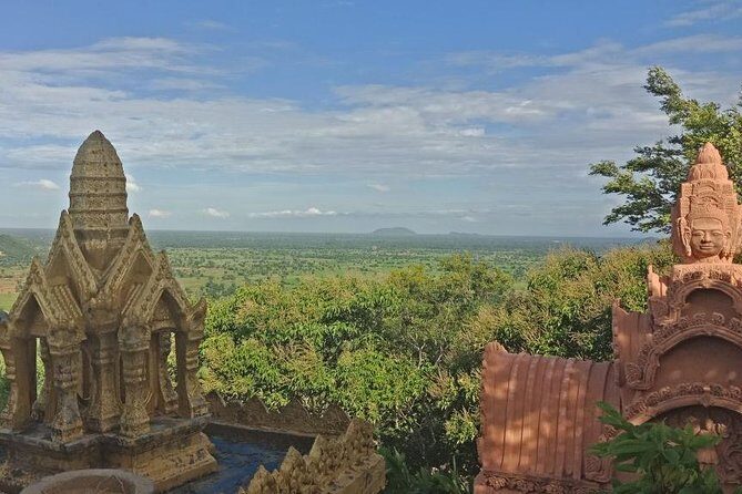 Battambang Full Day Tour from Siem Reap - Bamboo Train, Killing Cave & Sunset - Sunset bat watching at Phnom Sampeau: waiting that turns into a spectacle