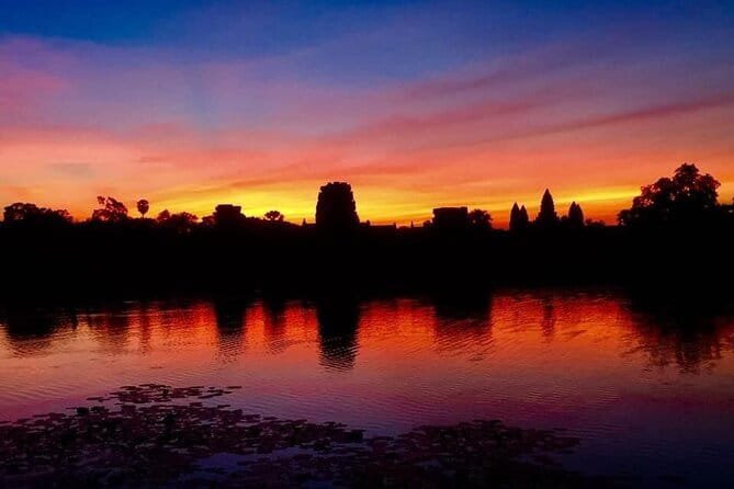 Explore Angkor Sunrise Spectacle a Full Day Temples Tour - Pickup, AC comfort, and the guide who keeps you on track