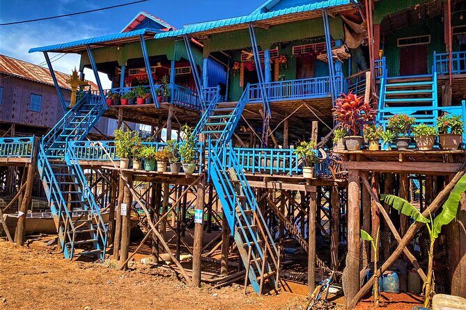 Floating Village-Mangrove Forest Private Tonle Sap Lake Boat Tour - Ro Lous Market: everyday trading with Angkor-era vibes