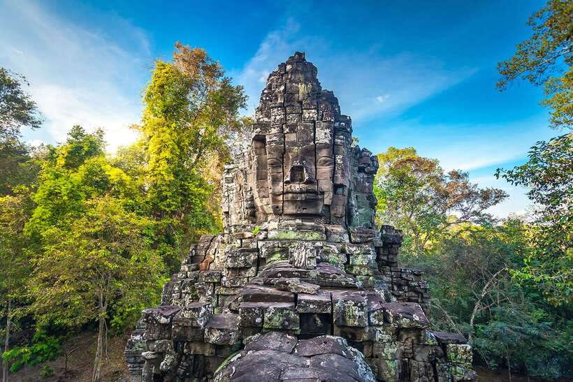 From Siem Reap: Angkor Wat Full-Day Private Tour & Sunrise - Angkor Thom through the Ancient Gate: elephants and big faces