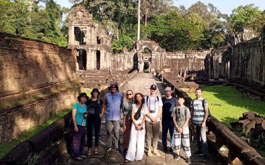 From Siem Reap: Banteay Srei Temple & Grand 5 Temple Tour - Ta Som and Preah Khan: tree roots, then carvings everywhere