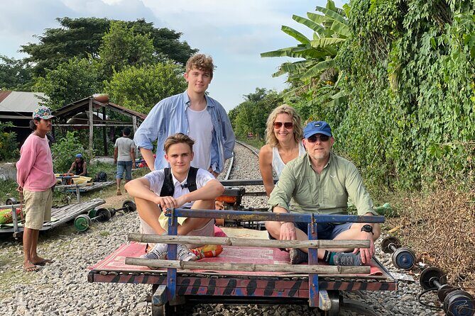 Full day tour by bicycle & tuk tuk,bamboo train,bat cave,villages - Battambang city morning: colonial streets, wat stops, and local markets