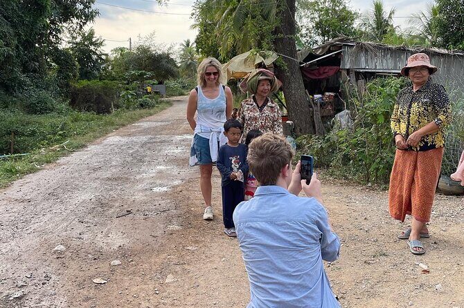 Full day tour by bicycle & tuk tuk,bamboo train,bat cave,villages - Phnom Sampov and the bat caves: killing cave, cannon/gun, monastery, and sunset views