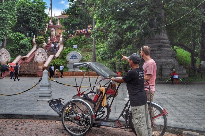 Hidden Phnom Penh City Tour, Royal Palace, Wat Phnom - The best part: a 1-hour cyclo loop through markets and coffee