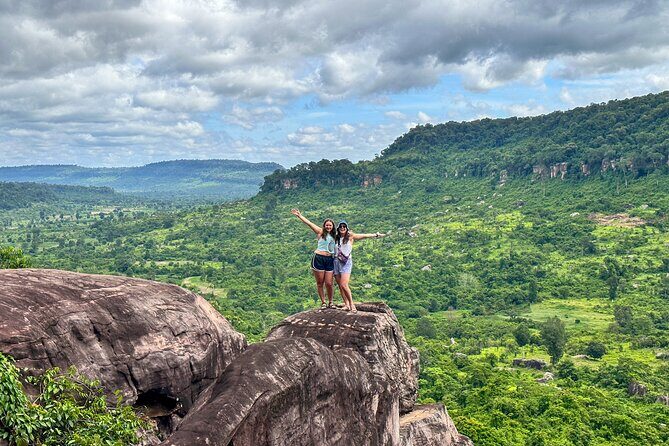 Kulen Mountain Tour with Picnic and Floating Village Sunset - Phnom Kulen National Park: waterfalls, Poeng Ta Kho cliff, and a reclining Buddha