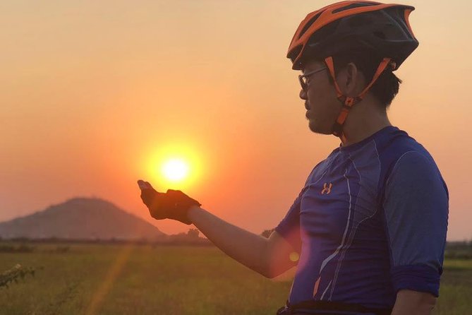 One Day tour with sunrise in car with A/C or Van & Guide. - Angkor Thom and Bayon: the smiling faces, the scale, and the sense of place