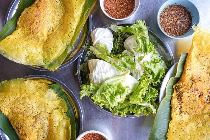 Phnom Penh Morning Market & Food Tour by Tuktuk - Includes All Food & Drinks! - Khmer breakfast comfort: grilled pork and rice at Stop 4