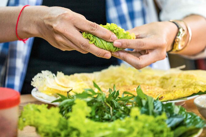 Phnom Penh Morning Market & Food Tour by Tuktuk - Includes All Food & Drinks! - Savory turmeric crepes: the yellow-power stop at Stop 5