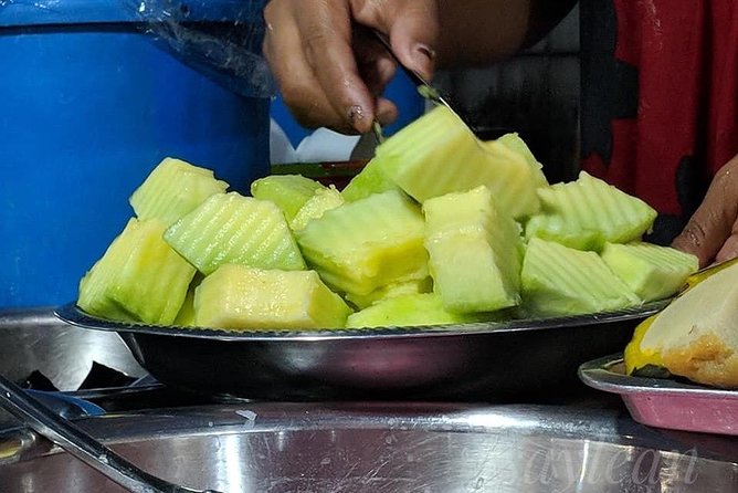 Phnom Penh Nightlife Street Food Tours - Kandal Market near the river: grilled BBQ flavors and smoky street stalls