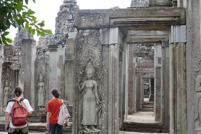 Private Angkor Sunrise, Guide Breakfast and Tuktuk included - Bayon Temple at 11:30AM: the faces of Angkor Thom