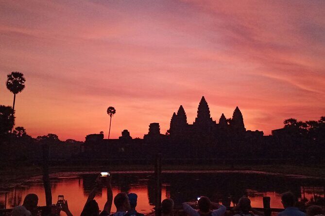 Private One Day Tour with Sunrise at Angkor Wat - Angkor Thom South Gate and Bayon faces: big symbolism, short time, sharp angles