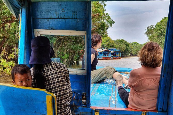 Private sunrise tour to Angkor Wat & other highlights with Professional Guide. - Ta Prohm: The Roots, the Crowd Control, and the Film Factor