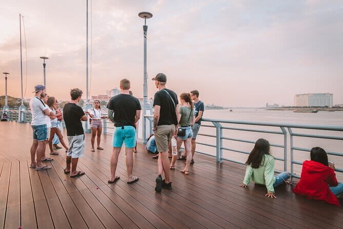 Riverside Walking Tour with Snack, Drinks & Local Ferry Ride - Royal Palace stop: ferry ride first, then riverside sightseeing