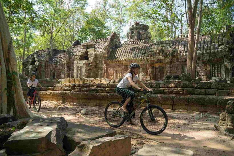 Siem Reap: Angkor Temples Off-Track Bicycle Tour - Rolling Toward the Walls of Angkor Wat on Two Wheels