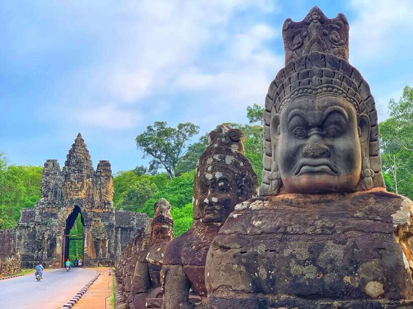Siem Reap: Angkor Wat Private Tour by Tuk Tuk - Phimeanakas: steep steps, shaded jungle, and a view gamble