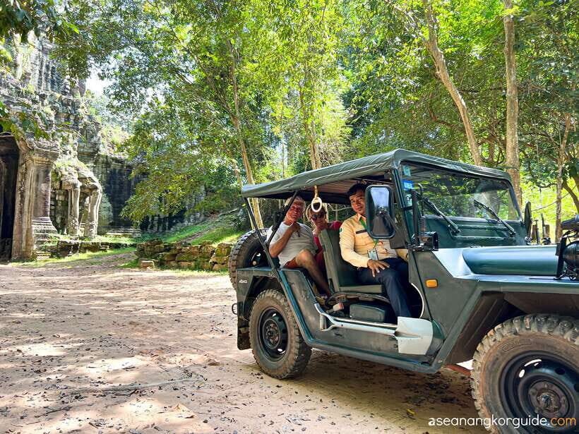 Siem Reap: Angkor Wat Sunrise and Market Tour by Jeep - Bayon Temple and Victory Gate: the stone faces and the city’s boundary