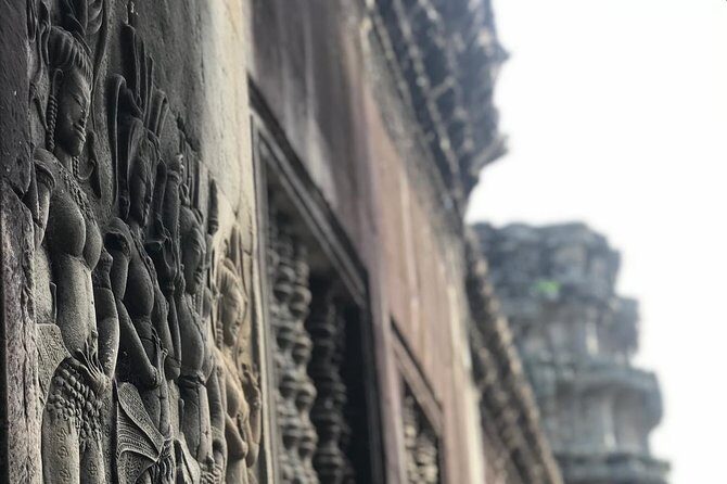 Siem Reap Angkor Wat Sunrise Explore The Most Iconic Temples - Tonle Om Gate: the last photo run through gods and demons