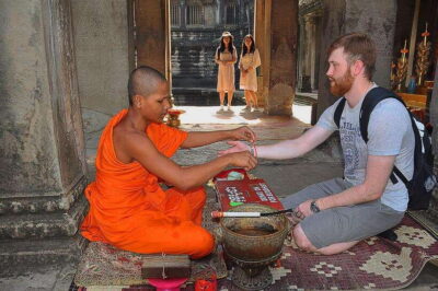 Siem Reap Cambodian Buddhist Water Blessing and Local Market - Wat Athvear Temple time: setting the mood before the ritual