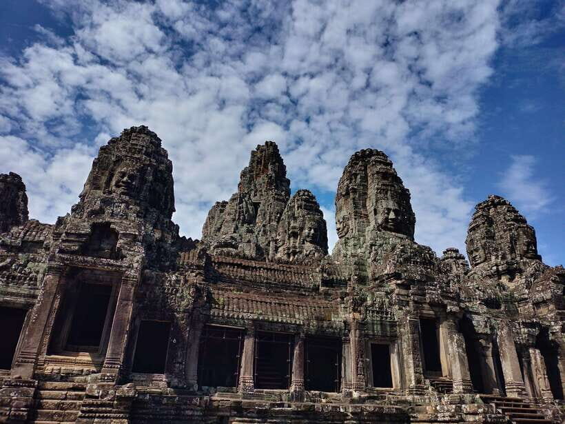 Siem Reap Private Tour: Angkor Wat Sunrise And Banteay Srei - Ta Prohm: tree roots, Hollywood vibes, and real-world scale