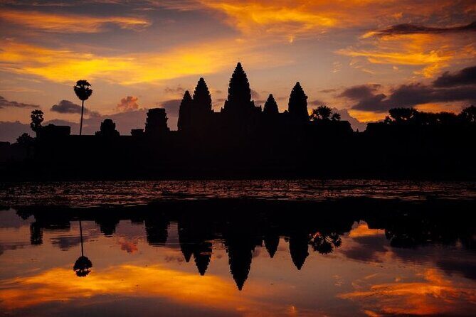 Siem Reap Tour: Angkor Wat Sunrise, Bayon, Ta Prohm, Banteay Srei - Bayon and Angkor Thom South Gate: Faces, Demons, and a Quick Grand Finale