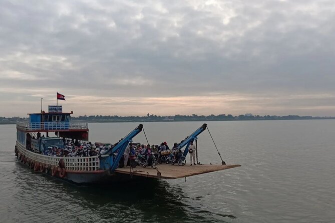Silk Island at Twilight Cycle Encounter - Cycling beside the Mekong: villages, temples, plantations, and fruit breaks