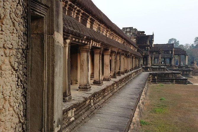 Sunrise Tour of Angkor Temples from Siem Reap - Angkor Thom city and the Phnom Temples en route to Bayon